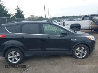 2016 Ford Escape SE with VIN 1FMCU9GX6GUA81609, listed as a IAAI auction lot 41947984 with 159,254 mi miles. Bid and sale history available at carsss.com. Image 13.
