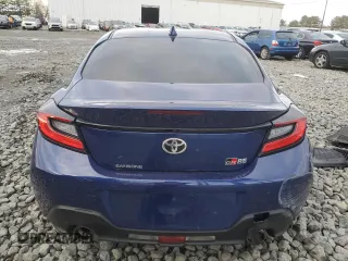 2024 Toyota GR86 with VIN JF1ZNBB19R9756189, listed as a Copart auction lot 86570014 with 5,417 mi miles and Salvage Title. Bid and sale history available at carsss.com. Image 6.