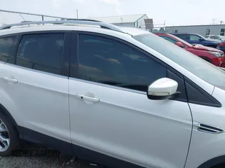 2015 Ford Escape Titanium с VIN 1FMCU9J98FUB38384, выставлен на аукционе IAAI как лот 42422326 с пробегом 120 358 миль миль и . История ставок и продаж доступна на DreamBid. Изображение 13.