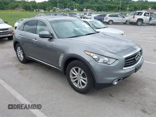 2014 Infiniti QX70 z VIN JN8CS1MWXEM413155, wystawiony jako IAAI lot #42345079 z przebiegiem 177 098 mil mil oraz . Historia ofert i sprzedaży dostępna na DreamBid. Obrazek 1.