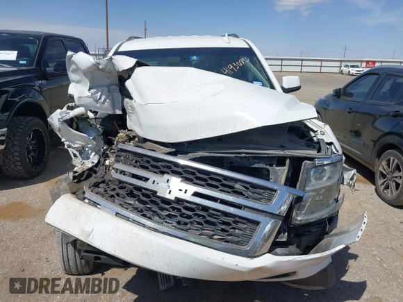 2015 Chevrolet Tahoe LS with VIN 1GNSCAKC3FR687421, listed as a IAAI auction lot 41930895 with Not provided miles and . Bid and sale history available at DreamBid. Image 12.