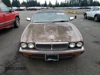 1995 Jaguar XJ with VIN SAJKX1742SC746763, listed as a Copart auction lot 84949964 with Not Provided miles and Clean Title. Bid and sale history available at DreamBid. Image 5.