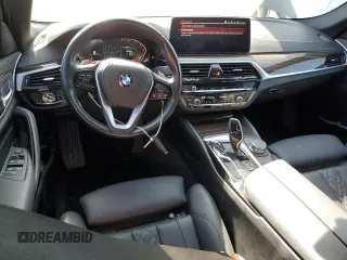 2023 BMW 5 Series 530i with VIN WBA53BH05PCM01563, listed as a Copart auction lot 55525515 with 23,371 mi miles and Salvage title. Bid and sale history available at DreamBid. Image 8.