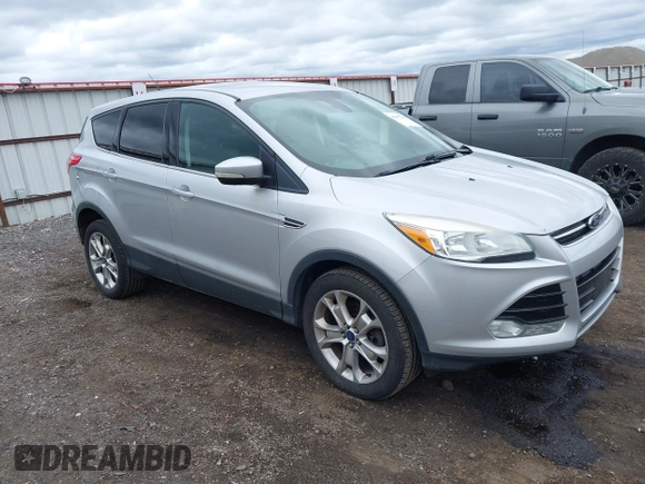 2013 Ford Escape SEL with VIN 1FMCU9H93DUD70670, listed as a IAAI auction lot 41867784 with 207,956 mi miles. Bid and sale history available at carsss.com. Image 1.