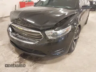 2015 Ford Taurus SEL with VIN 1FAHP2H80FG133240, listed as a IAAI auction lot 41897873 with 189,059 mi miles. Bid and sale history available at carsss.com. Image 6.