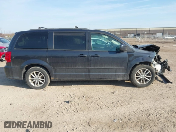 2013 Dodge Grand Caravan SXT with VIN 2C4RDGCG4DR602893, listed as a IAAI auction lot 41747242 with 206,213 mi miles and . Bid and sale history available at DreamBid. Image 13.