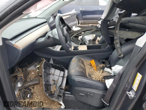 2023 Tesla Model Y Long Range z VIN 7SAYGDEE7PF870370, wystawiony jako Copart lot #55700135 z przebiegiem 32 410 mil mil oraz Szkoda całkowita • Salvage title. Historia ofert i sprzedaży dostępna na DreamBid. Obrazek 7.