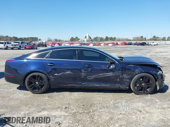 2014 Jaguar XJ Portfolio with VIN SAJWA2GZ4E8V60251, listed as a IAAI auction lot 41778702 with 45,180 mi miles and . Bid and sale history available at DreamBid. Image 13.