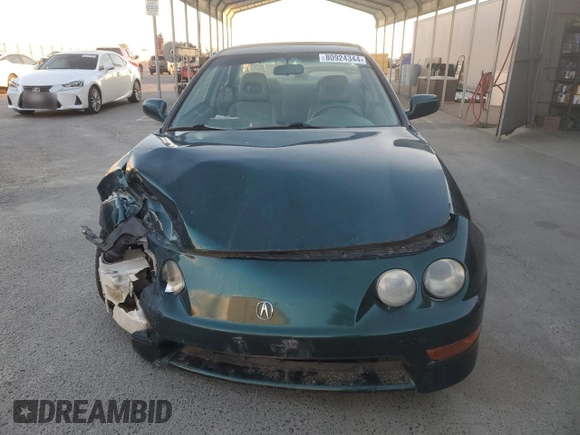 1999 Acura Integra with VIN JH4DB7665XS000928, listed as a Copart auction lot 80924344 with 198,981 mi miles and Salvage title. Bid and sale history available at DreamBid. Image 5.