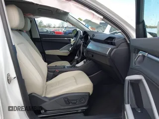 2023 Audi Q3 S line Premium Plus with VIN WA1EECF36P1140594, listed as a IAAI auction lot 41283650 with 14,793 mi miles and . Bid and sale history available at DreamBid. Image 5.