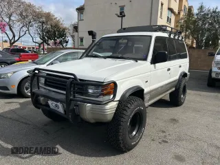 1997 Mitsubishi Montero z VIN JA4MR41R3VJ007919, wystawiony jako Copart lot #51544685 z przebiegiem 268 046 mil mil oraz Czysty tytuł • Clean title. Historia ofert i sprzedaży dostępna na DreamBid. Obrazek 2.