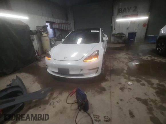 2022 Tesla Model 3 Long Range with VIN 5YJ3E1EB5NF334516, listed as a Copart auction lot 43247755 with 23,412 mi miles and Salvage Title. Bid and sale history available at DreamBid. Image 14.