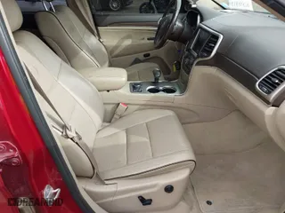 2014 Jeep Grand Cherokee Overland with VIN 1C4RJFCM0EC492833, listed as a IAAI auction lot 41836579 with 120,168 mi miles. Bid and sale history available at carsss.com. Image 5.