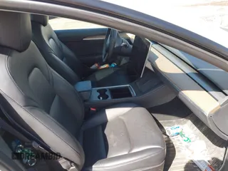2023 Tesla Model 3 с VIN 5YJ3E1EA4PF433984, выставлен на аукционе IAAI как лот 41834180 с пробегом Не указан миль и . История ставок и продаж доступна на DreamBid. Изображение 5.
