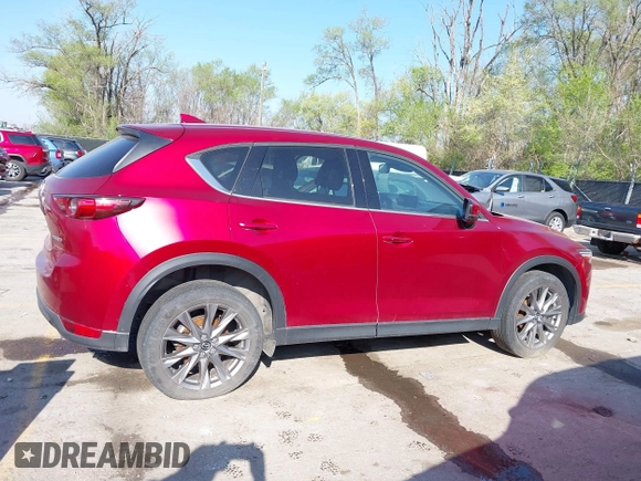 2021 Mazda CX-5 Grand Touring with VIN JM3KFBDM8M1390188, listed as a IAAI auction lot 42000444 with 84,908 mi miles. Bid and sale history available at carsss.com. Image 12.