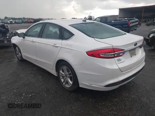 2018 Ford Fusion SE z VIN 3FA6P0H75JR159448, wystawiony jako IAAI lot #42262839 z przebiegiem 144 353 mil mil oraz . Historia ofert i sprzedaży dostępna na DreamBid. Obrazek 3.