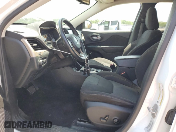 2016 Jeep Cherokee Altitude with VIN 1C4PJLCB8GW207480, listed as a Copart auction lot 62026585 with 124,229 mi miles and Salvage title. Bid and sale history available at DreamBid. Image 7.