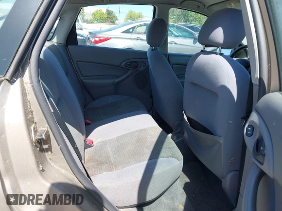 2004 Ford Focus SE with VIN 1FAFP34354W103841, listed as a IAAI auction lot 42099046 with 112,231 mi miles and . Bid and sale history available at DreamBid. Image 8.