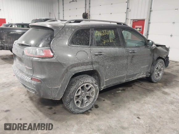 2021 Jeep Cherokee Trailhawk z VIN 1C4PJMBX4MD148597, wystawiony jako IAAI lot #41622099 z przebiegiem 48 452 mil mil oraz . Historia ofert i sprzedaży dostępna na DreamBid. Obrazek 4.