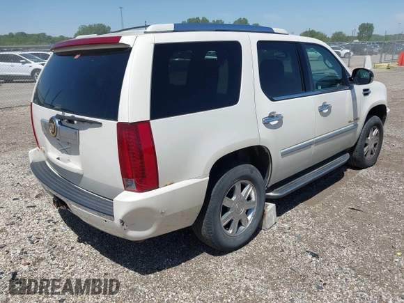 2007 Cadillac Escalade z VIN 1GYFK63827R299936, wystawiony jako IAAI lot #42254274 z przebiegiem 193 798 mil mil oraz . Historia ofert i sprzedaży dostępna na DreamBid. Obrazek 4.