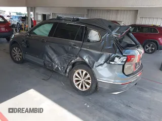 2018 Volkswagen Tiguan SEL with VIN 3VV3B7AXXJM213579, listed as a IAAI auction lot 42664339 with 84,676 mi miles and . Bid and sale history available at DreamBid. Image 3.