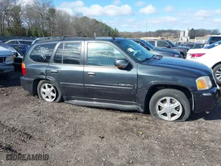 2005 GMC Envoy Denali with VIN 1GKET63M052336214, listed as a IAAI auction lot 41852417 with 999,999 mi miles. Bid and sale history available at carsss.com. Image 6.