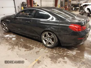 2012 BMW 6 Series 650i xDrive with VIN WBALX5C57CC894205, listed as a IAAI auction lot 41591874 with 110,932 mi miles. Bid and sale history available at carsss.com. Image 3.