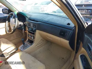 2003 Subaru Forester X with VIN JF1SG63673H757951, listed as a IAAI auction lot 41662103 with 168,433 mi miles. Bid and sale history available at carsss.com. Image 5.