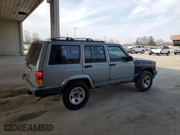 2000 Jeep Cherokee with VIN 1J4FF48S7YL221475, listed as a Copart auction lot 53005275 with 273,246 mi miles and Clean title. Bid and sale history available at DreamBid. Image 3.