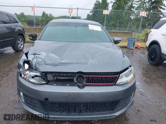 2014 Volkswagen Jetta GLI z VIN 3VW4T7AJ2EM208598, wystawiony jako IAAI lot #42381855 z przebiegiem 82 761 mil mil oraz . Historia ofert i sprzedaży dostępna na DreamBid. Obrazek 12.