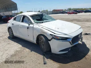 2021 Mazda 3 Select with VIN JM1BPABL0M1333705, listed as a IAAI auction lot 41819213 with 82,977 mi miles and . Bid and sale history available at DreamBid. Image 1.