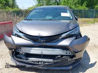 2021 Toyota Sienna LE with VIN 5TDKSKFC4MS004345, listed as a IAAI auction lot 42145140 with 103,544 mi miles and . Bid and sale history available at DreamBid. Image 6.