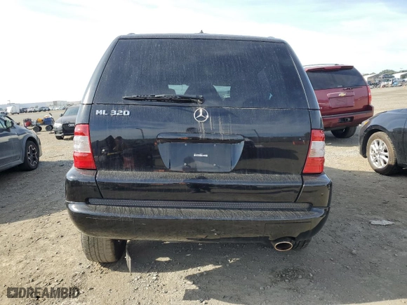 2002 Mercedes-Benz M-Class with VIN 4JGAB54E42A300392, listed as a Copart auction lot 85862904 with 50,852 mi miles and Salvage Title. Bid and sale history available at carsss.com. Image 6.