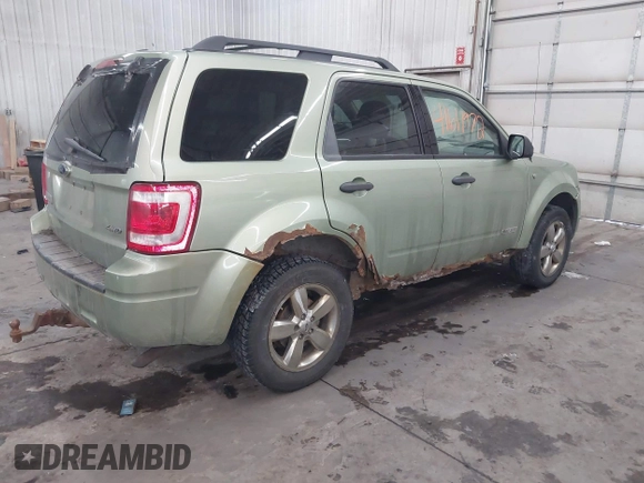 2008 Ford Escape XLT with VIN 1FMCU931X8KE68551, listed as a IAAI auction lot 41611972 with 267,034 mi miles. Bid and sale history available at carsss.com. Image 4.