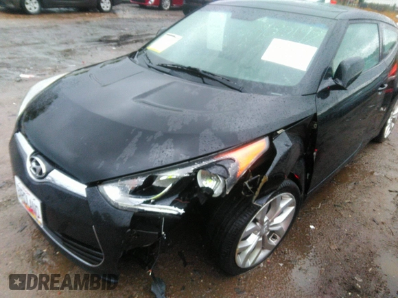 2012 Hyundai Veloster w/Gray Int with VIN KMHTC6AD2CU024382, listed as a IAAI auction lot 41980192 with 46,684 mi miles and . Bid and sale history available at DreamBid. Image 6.