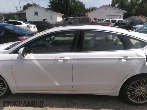 2016 Ford Fusion SE with VIN 3FA6P0H9XGR363785, listed as a IAAI auction lot 42312744 with 151,919 mi miles and . Bid and sale history available at DreamBid. Image 14.