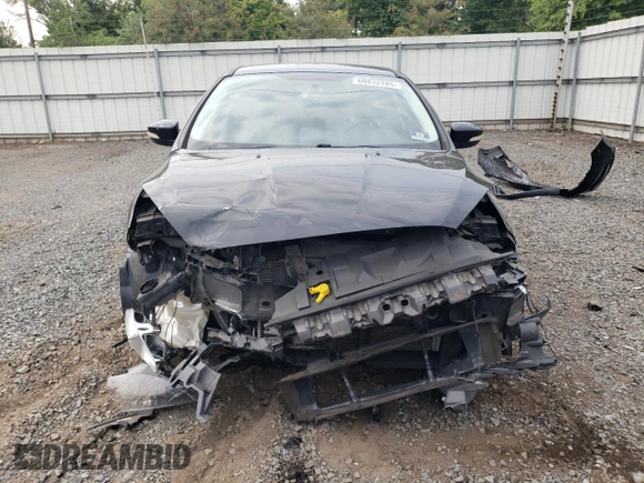 2016 Ford Focus Titanium with VIN 1FADP3N2XGL299598, listed as a Copart auction lot 60832285 with 121,482 mi miles and Salvage title. Bid and sale history available at DreamBid. Image 5.