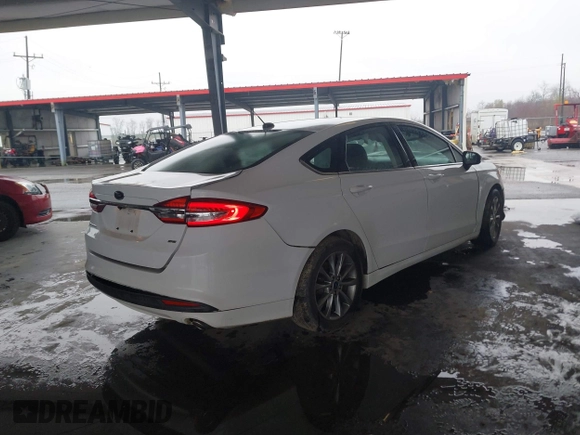 2017 Ford Fusion SE with VIN 3FA6P0H74HR196954, listed as a IAAI auction lot 41636002 with 70,366 mi miles and . Bid and sale history available at DreamBid. Image 4.