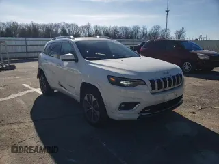 2019 Jeep Cherokee Overland with VIN 1C4PJMJN3KD173830, listed as a Copart auction lot 87229794 with 82,433 mi miles and Salvage title. Bid and sale history available at DreamBid. Image 12.