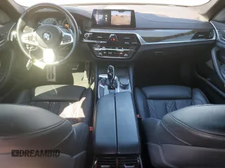 2019 BMW 5 Series M550i xDrive with VIN WBAJB9C57KB289036, listed as a Copart auction lot 86292134 with 28,103 mi miles and Salvage title. Bid and sale history available at DreamBid. Image 8.
