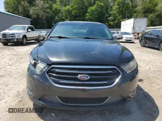 2015 Ford Taurus Limited z VIN 1FAHP2F82FG103711, wystawiony jako Copart lot #57158265 z przebiegiem 205 999 mil mil oraz Szkoda całkowita • Salvage title. Historia ofert i sprzedaży dostępna na DreamBid. Obrazek 5.
