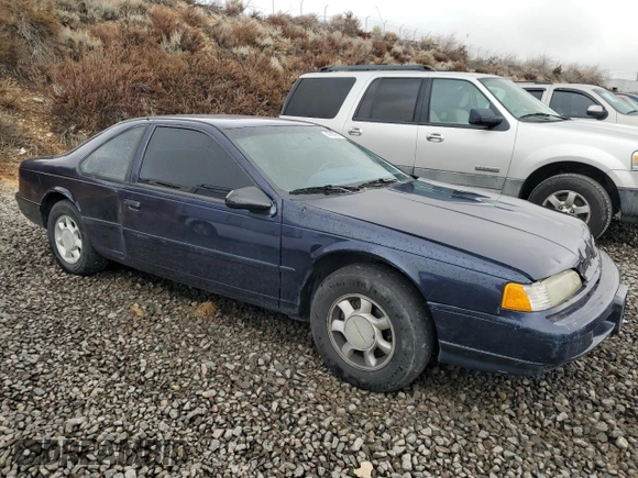 1993 Ford Thunderbird with VIN 1FAPP6245PH191395, listed as a Copart auction lot 47882875 with 91,366 mi miles and Clean Title. Bid and sale history available at DreamBid. Image 4.
