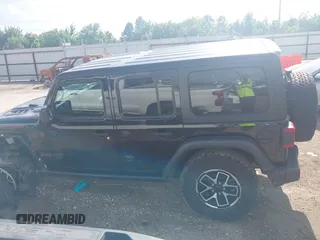 2024 Jeep Wrangler Rubicon with VIN 1C4PJXFG0RW271322, listed as a IAAI auction lot 42736647 with 32,319 mi miles and . Bid and sale history available at DreamBid. Image 14.