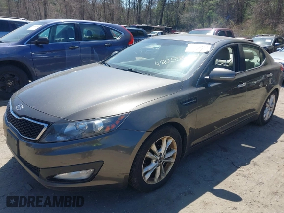 2011 Kia Optima EX with VIN KNAGN4A66B5091790, listed as a IAAI auction lot 42055648 with 208,098 mi miles and . Bid and sale history available at carsss.com. Image 2.