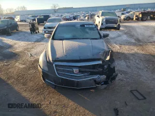 2017 Cadillac ATS AWD z VIN 1G6AG1RX9H0117872, wystawiony jako Copart lot #87591125 z przebiegiem 76 336 mil mil oraz Czysty tytuł • Clean title. Historia ofert i sprzedaży dostępna na DreamBid. Obrazek 5.
