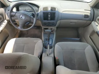 2002 Mazda Protege DX z VIN JM1BJ225020537013, wystawiony jako Copart lot #56952495 z przebiegiem 129 846 mil mil oraz Czysty tytuł • Clean title. Historia ofert i sprzedaży dostępna na DreamBid. Obrazek 8.