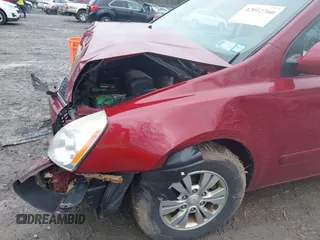 2012 Kia Sedona LX with VIN KNDMG4C72C6493162, listed as a IAAI auction lot 42012760 with 158,433 mi miles. Bid and sale history available at carsss.com. Image 12.