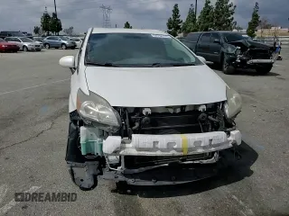 2012 Toyota Prius с VIN JTDKN3DPXC3012985, выставлен на аукционе Copart как лот 54758125 с пробегом 246 860 миль миль и Списание • Salvage title. История ставок и продаж доступна на DreamBid. Изображение 14.