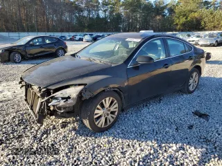 2009 Mazda 6 i Grand Touring with VIN 1YVHP82A595M22097, listed as a Copart auction lot 85905774 with 200,525 mi miles and Salvage Title. Bid and sale history available at carsss.com. Image 1.