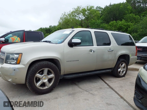 2013 Chevrolet Suburban LT with VIN 1GNSKJE74DR166223, listed as a IAAI auction lot 42172184 with 200,901 mi miles and . Bid and sale history available at DreamBid. Image 14.